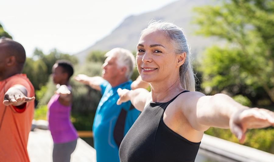 Older woman practicing yoga